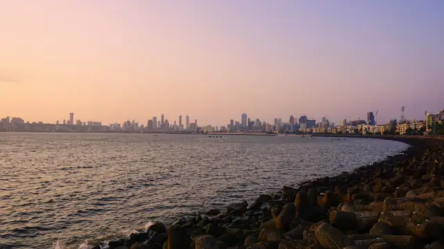 City skyline across the water at dusk